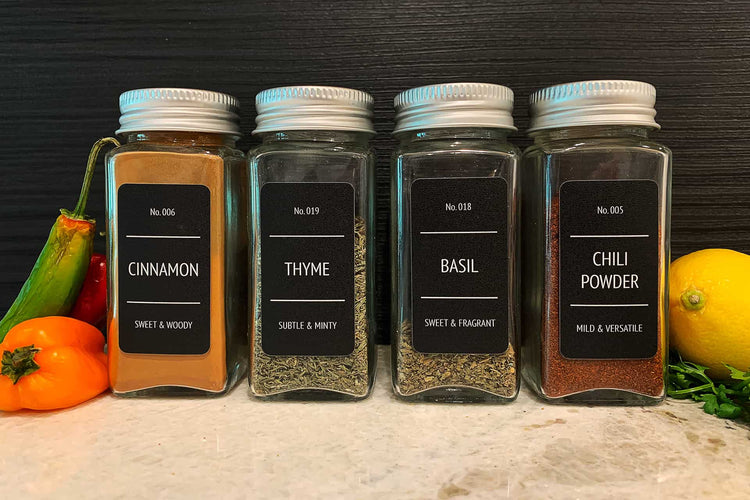 Modern style, vinyl spice bottle labels - shown in black - in a kitchen setting: Sleek and stylish labels on spice bottles, adding a contemporary touch to the kitchen decor while enabling easy identification of various spices.