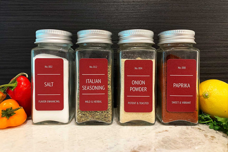 Modern style, vinyl spice bottle labels - shown in burgundy - in a kitchen setting: Sleek and stylish labels on spice bottles, adding a contemporary touch to the kitchen decor while enabling easy identification of various spices.