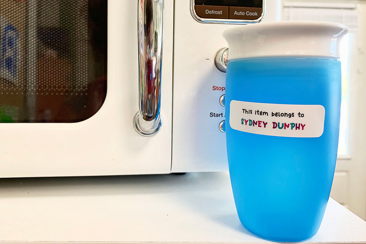Vinyl identification sticker on preschool child's cup for daycare: Labeled cup with child's name, ensuring easy identification and preventing mix-ups, promoting a safe and hygienic environment.