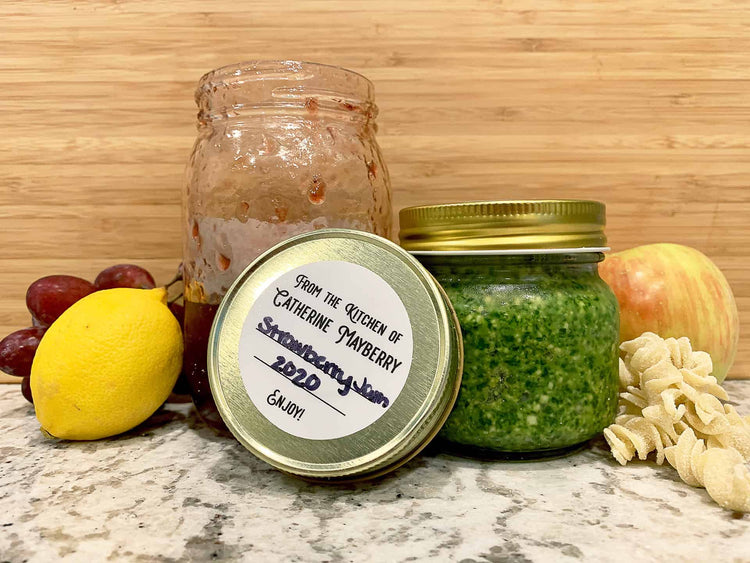 Custom vinyl mason jar labels applied to homemade jam with a handwritten message: Personalized labels featuring a handwritten message on mason jars filled with homemade jam, adding a heartfelt touch and enhancing the personalization of the jars.