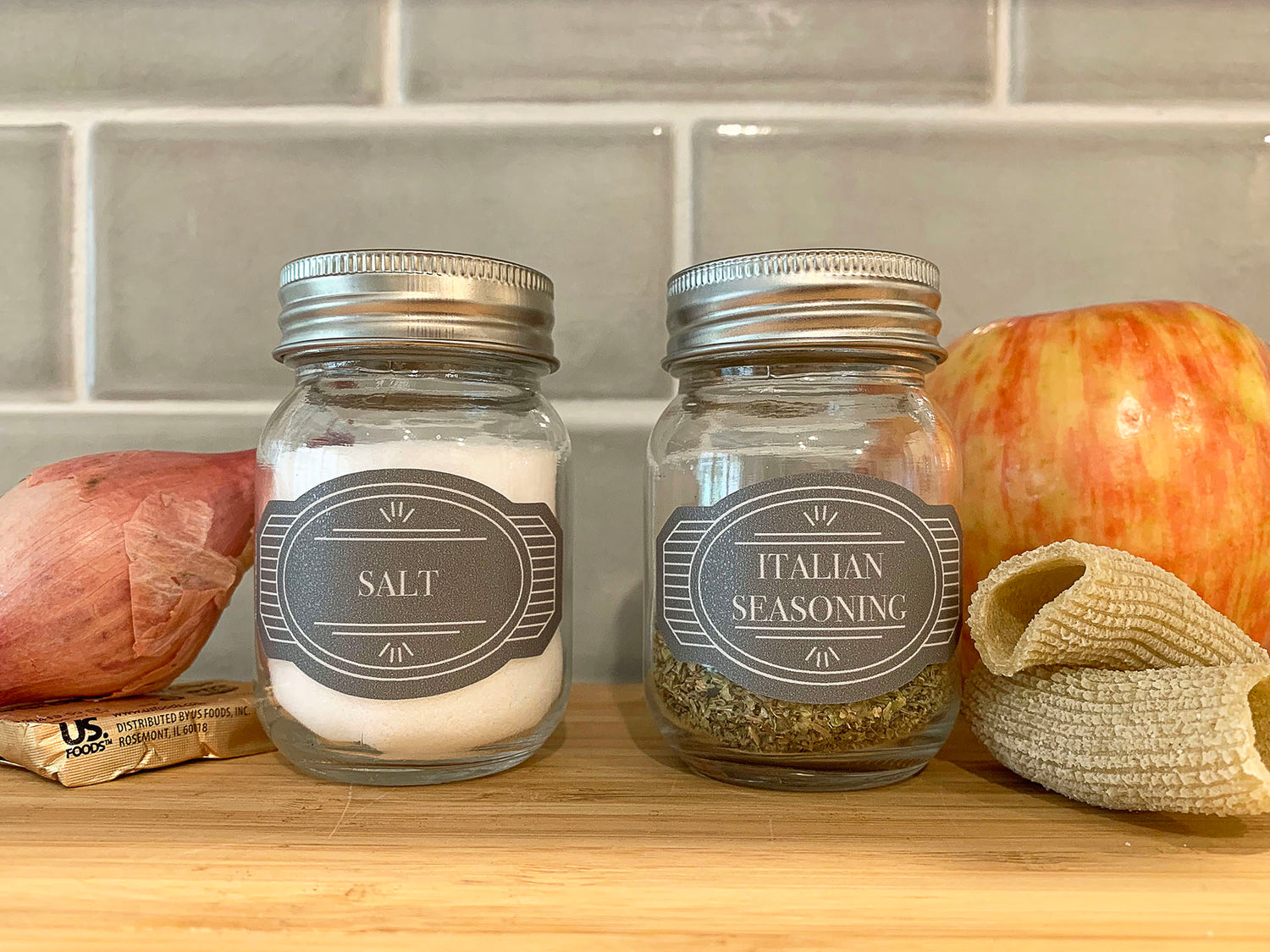 White vintage-style spice bottle vinyl decals in a kitchen: Classic and elegant labels on spice bottles, evoking a vintage aesthetic in the kitchen while ensuring easy identification of the various spices.